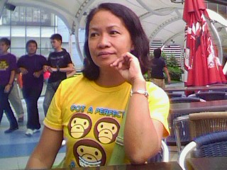 this is my mom... - she's my ever supportive and loving mother..taken at starbucks during our bonding moment..