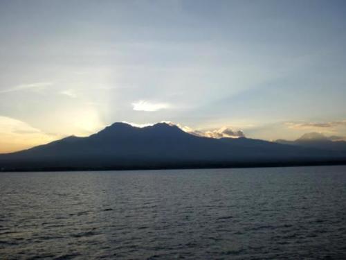sunset - The mountain is called mount Talinis situated in the island of Oriental Negros. Infront of the mountain lies the ocean called Tanon strait situated between the island of cebu and island of negros.