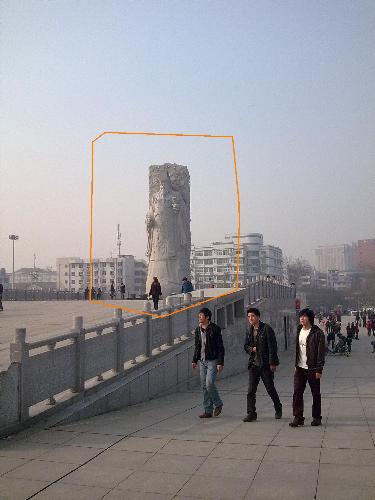 Monument represents our city's history. - The monument I circled in the picture is called Qinshihuang Monument which carved his portrait. Qishihuang is the very first emperor in Chinese ancient time when feudalism society begins. He is a man who's cruel to his people and killed many knowledgeable person. He begins his control in our city. Then Terra Cotta Worriors appears in Xi'an city where is only half an hour drive from ours. This is a obvious sign of showing his cruelty that thousnds of people buried alive when he died as funeral objects. :)