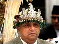 King Gyanendra - NEPAL - King Gyanendra recalled parliament in April 2006 after weeks of strikes and protests against his direct rule.   King Gyanendra: Parliament voted to curtail the monarch's powers  Weeks later, parliament voted unanimously to curtail the monarch's political powers, effectively rendering him a ceremonial figure. The king sacked the government in February 2005, assumed absolute power and appointed a mainly pro-monarchist cabinet.  He said the former administration, under Prime Minister Sher Bahadur Deuba, had failed to stem Maoist violence and to organise elections. The monarch's actions triggered protests at home and criticism from abroad. King Gyanendra ascended the throne in June 2001 soon after then Crown Prince Dipendra gunned down his parents King Birendra and Queen Aishwarya and seven other royals. The 29-year-old prince ran amok at a family dinner in a drunken and drug-fuelled rage before killing himself. King Gyanendra was born in 1947. He is married and has two children. His youngest son, Paras, is the heir to the throne.