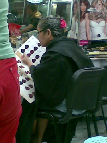 beauty parlor - woman having her hair dyed