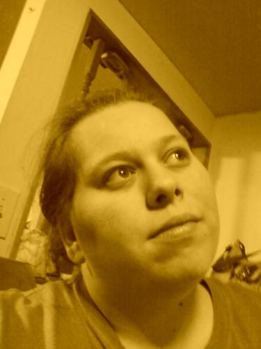 A picture that I took of myslef using my cell phon - I took this of myself with my cell phone.