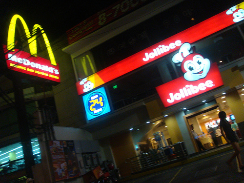 Mcdo or jollibee? - Hi!

Mcdonald&#039;s and Jollibee are both present here in our country (the Philippines). Foods served are western, like hamburgers, pasta, fried chicken, ice cream, etc. Both served these kinds of foods. 

But one thing you need to know that Jollibee is of Filipino origin. Although their food are western, they add some Filipino touch to it. 

Mcdoonald&#039;s on the other hand, is of American origin. the first foodchain to serve.

Personally, i love eating in jollibee more than Mcdo because of the taste. Their burgers are more juicy than the other one. Especially the spaghetti which contains lots of sauce and mind you, it&#039;s sweet.

Anyways, that&#039;s only my opinion. How about you guys? what do you think about it?



photo source: www.flickr.com/
photos/redbubble/
3293262765/