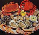 seafood - This plate contains a colorful array of seafood. 