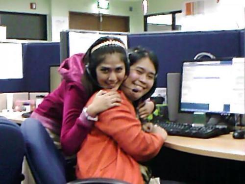 at work - In this photo, I am with one of my colleague and as time passed by, eventually she became my close friend. She was also one of the reasons why I stayed in the company because it came to a point that I really grew tired of being in a cal center.