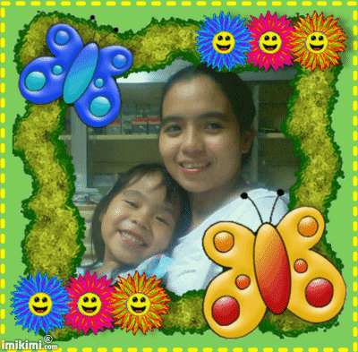 me & cousin mariel - picture taking with my cousin, mariel