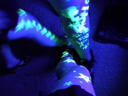 Black light fun - This is a pic from a black light party. My two friends and I drew on our legs with highlighters. Mine is the one with the stars. It was lots of fun.