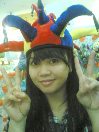 Happy Moment - It looks like I am in a carnival but the truth is I was just strolling in the mall then found a hat vendor so I tried one and took a picture of myself.