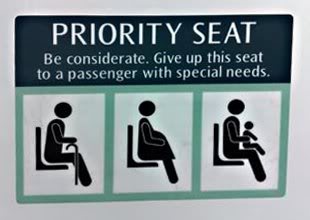 MRT priority seat - Sticker inside train cabin to remind giving up of seat to elderly.