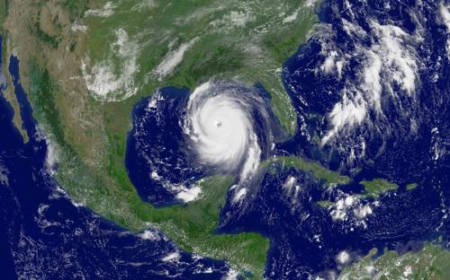 Hurricane Katrina in the Gulf of Mexico - Hurricane Katrina was the costliest hurricane in US history, totaling more than $75 billion in 2005 (more than $100 billion in 2009) in damages. Hurricane Katrina formed from a tropical wave fed by the remnants of TD10. On August 23, 2005, TD12 formed just in the Bahamas. The tropical storm moved west and strengthened into Tropical storm Katrina. Its next target was Northern portions of Miami-Dade County. On August 24-25, Katrina strengthened to a Category 1 hurricane, while 50 miles east of Miami-Dade County. When it hit, Katrina dumped over 15 inches of rain in Southern Miami-Dade county, prompting flooding. With winds of 70-75 mph, the storm exited Florida Bay, and underwent explosive deepening in the Gulf of Mexico. By August 27, the storm reached Category 3 strength, then strengthening more to a Category 5 hurricane, the highest category on the Saffir-Simpson Scale. By August 30, having weakened to Category 3 strength, Katrina made landfall in Louisiana and Alabama. Katrina ravaged the Louisiana Coastline for 6 hours before moving north. In its wake, Katrina created a scene that no one wanted to see again; people getting sick, people cannot get out of the Astrodome, and no buses and no travel. It took 6 days to get the entire personnel out of the dome., and it took 5 years to clean up 20% of the damages left by Katrina. All in all, Katrina was the worst hurricane in 2005's super season. Hurricane Katrina in the Gulf of Mexico - Hurricane Katrina was the costliest hurricane in US history, totaling more than $75 billion in 2005 (more than $100 billion in 2009) in damages. Hurricane Katrina formed from a tropical wave fed by the remnants of TD10. On August 23, 2005, TD12 formed just in the Bahamas. The tropical storm moved west and strengthened into Tropical storm Katrina. Its next target was Northern portions of Miami-Dade County. On August 24-25, Katrina strengthened to a Category 1 hurricane, while 50 miles east of Miami-Dade County. When it hit, Katrina dumped over 15 inches of rain in Southern Miami-Dade county, prompting flooding. With winds of 70-75 mph, the storm exited Florida Bay, and underwent explosive deepening in the Gulf of Mexico. By August 27, the storm reached Category 3 strength, then strengthening more to a Category 5 hurricane, the highest category on the Saffir-Simpson Scale. By August 30, having weakened to Category 3 strength, Katrina made landfall in Louisiana and Alabama. Katrina ravaged the Louisiana Coastline for 6 hours before moving north. In its wake, Katrina created a scene that no one wanted to see again; people getting sick, people cannot get out of the Astrodome, and no buses and no travel. It took 6 days to get the entire personnel out of the dome., and it took 5 years to clean up 20% of the damages left by Katrina. All in all, Katrina was the worst hurricane in 2005's super season.