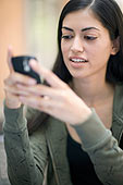 just don't let it go! - woman with a cellphone at hand.make sure to be careful of the thing that is really important to you!