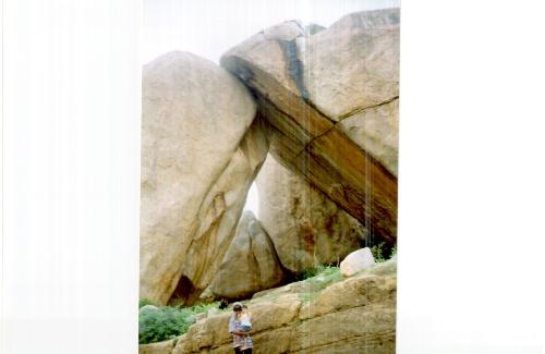 twin sister rocks, hampi, karnataka - savio and raj below twin sister rocks at hampi, karnataka.