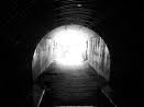 Or is it an oncoming train - Light at the end of the tunnel