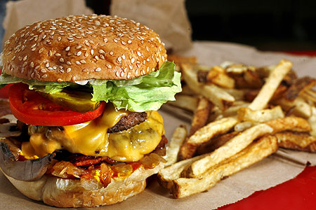 Burger and fries - A large serving of burger and fries, an irresistible meal.