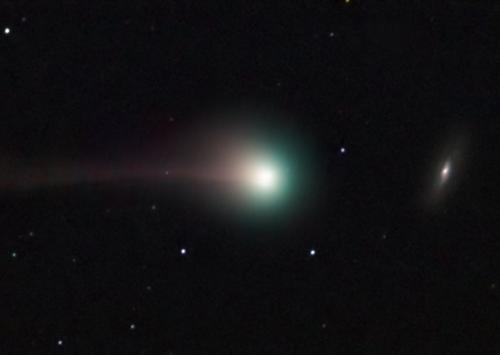 cosmic - This cosmic portrait recorded October 9th features the lovely blue-green coma of Comet SWAN posing with spiral galaxy NGC 5005 in the northern constellation Canes Venatici. At the time the comet (center) was in the close foreground, a mere 9 light-minutes from planet Earth, with the galaxy a more substantial 60 million light-years distant. Not actually related to a bird, Comet SWAN (C/2006 M4) was so named as it was first spotted in image data from the SWAN (Solar Wind ANisotropies) camera aboard the sun-staring SOHO spacecraft. Having rounded the Sun, this comet is headed for interstellar space, but first it will make its closest approach to Earth on October 24. With binoculars, northern hemisphere observers can now spot the comet above the northwestern horizon, near the handle of the Big Dipper in the early evening sky.