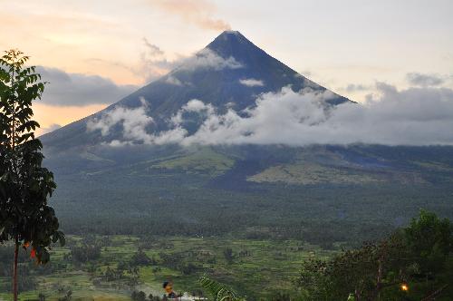 Mayon Volcano - Can you see the punchline? btw, the volcano is still active and just erupted late last year. There is also smoke rising from its crater.