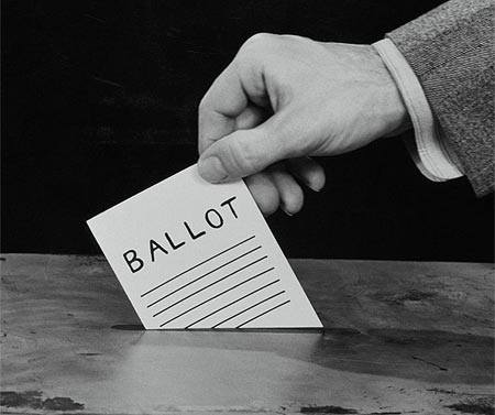 Right to vote - ballot with a hand.
