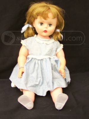Doll I Won IN GoodWill Auction - I won this doll at an auction on GoodWill

Can you tell me who put this doll out and her age?

She mus tbe old as I don't see dolls made like her or so well dressed;)

