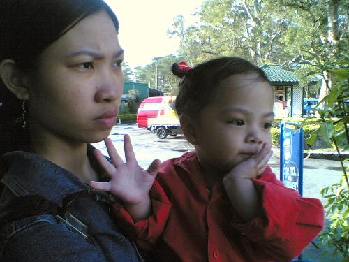 Moody Nanny - The girl on the left was my daughter's nanny three years ago. She was really moody. There were times when she would be jolly, then before you knew it, she would suddenly become sulky and refuse to talk.