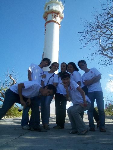 a glimpse from below - this photo was taken during our trip in pangasinan. the last day of our press conference were the most interesting part of the contest.. visiting places that i've only seen in pictures were the best experience ever.. behind us, is a lighthouse that has been idle for quite some years..it has been replaced by a more advanced tachnology in terms of its functions. i was blessed to see the vastness of nature that the lighthouse offers.. the exhaustion i felt while climbing it, is worth the picture i've seen at the height of its structure. :) it made me feel blessed for the wonderful creation that god allowed men to supervise yet, was made by the latter to perish.. i hope i could still see the same scene when i grow old..