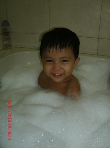my son on a bubble bath  - my cute son 