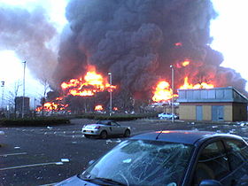 Buncefield fire - A picture of the Buncefield incident where a petrol tank exploded as a result of a vapor cloud formed because of an overflowed tank. The fire raged on for about 4 days and there were reports where the firemen who worked to extinguished the flames had to do it twice for a few tanks because it reignited. This was due to the property of petrol which was kept in the tanks and sheer amount of it. 