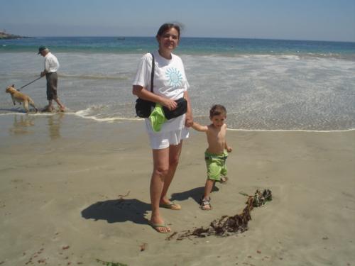 Posing beside a cochayuyo - My daughter took this picture of my grandson and myself 2 years ago, when we went to the beach in Chile. The cochayuyo is that algae at our feet. It can be taken for free but some local fishermen collect them and dry them to sell them at the capital´s Supermarkets.
