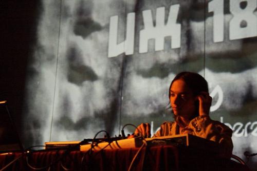 Playing music - The picture was taken at the festival of electronic music.