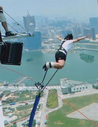 bungee jumping - i don't like trying this one,i guess i would love to try rapelling as well.