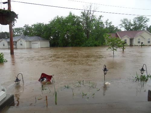 My flooded front yard - This is what my front yard looked like. Sad thing, it started raining again around 2 and didn't stop until around 7.