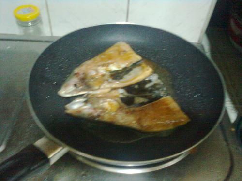frying fish - this is milkfish that i'm cooking.