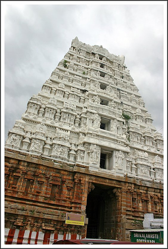SriKalaHasthi TEMPLE Raja Gopuram. Entrance Tower. - This temple is one of the most impressive Siva temples in India. Vishwakarma brahmin Sthapthis who sculpted this temple need to be eulogized for their excellent architectural cognizance. This temple features an enormous, ancient gopuram (entrance tower) over the main gate. The tower is 36.5m (120 ft) high. The entire temple is carved out of the side of a huge stone hill.