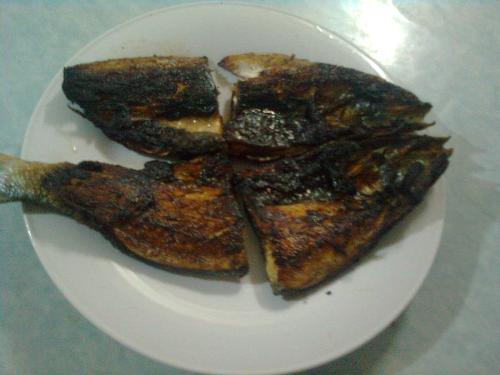 daing na bangus - i cut it into four cause it's easier for me to cook it thay way cause it won't fit to my non stick pan if i cook it whole.