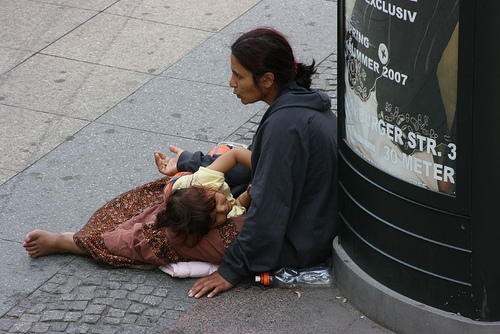 A woman and child begging - There but for the grace of God!!