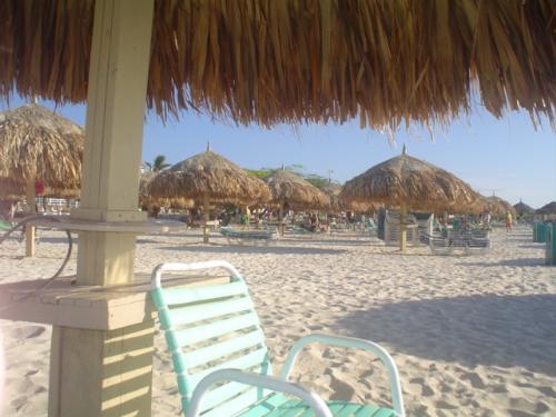 Aruba beach  - A chair to sitdown and read while looking at the beach and the sea at Aruba.