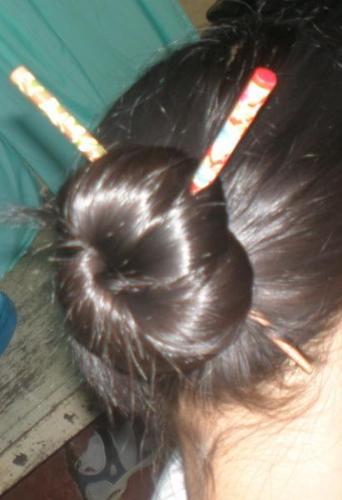 chopstick - when its hot, i do my hair like this...