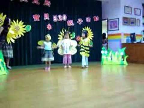 Kindergarten Show - A group of small children performing in a spring show.