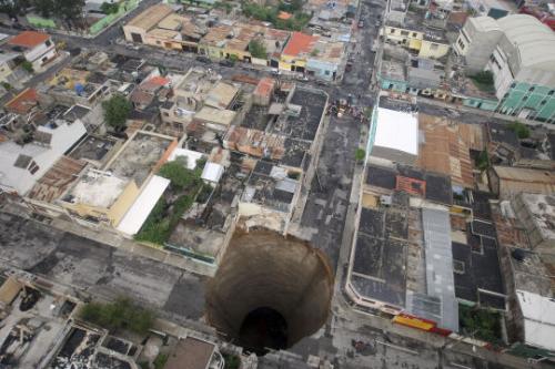 Central America Agatha is seen in Guatemala City - A giant sinkhole caused by the rains of Tropical Storm Agatha is seen in Guatemala City