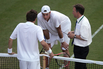 Mammoth Match - Nicolas Mahut and John Isner discuss stopping the match with a Wimbledon official.