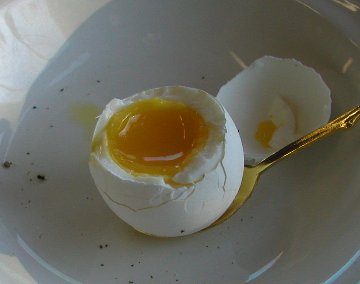 A soft boiled egg - A perfectly cooked soft-boiled egg waiting for its 'soldiers' !!