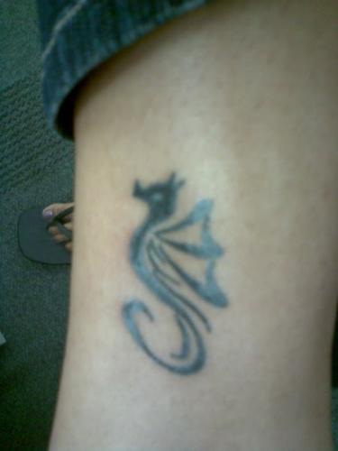 My first tattoo - Seahorse - On the inner right ankle.