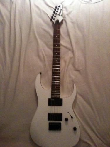 Ibanez Rg guitar - this is my ibanez rg 2ex2 fixed bridge, basic bolt on neck, and no special inlays, the emg pickups sound great though.