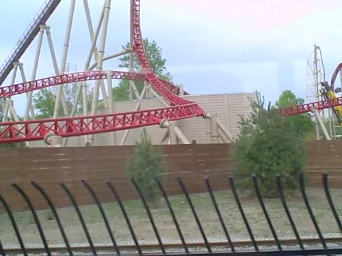 Roller Coasters  - The Maverick roller coaster at Cedar Point in Sandusky, Ohio. the ride goes as high as 105 feet and is only a couple of feet off the ground as it rides sideways before turning.