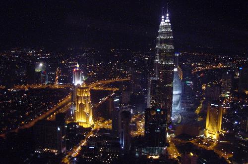 Night View of KUALA LUMPUR(MALAYSIA) - Kuala Lumpur has its origins in the 1850s, when the Malay Chief of Klang, Raja Abdullah, hired some Chinese labourers to open new and larger tin mines. They landed at the confluence of Sungai Gombak and Sungai Klang to open mines at Ampang.   The original name of this city was 'Pengkalan Lumpur', which mean bundle of mud. As time passes by the name changed to Kuala Lumpur which literally mean 'muddy confluence.