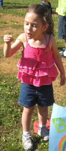 my daughter - This is a picture of my daughter at her end of year party. she is very active and loves doing stuff outside. 