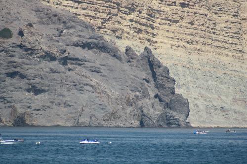 The Black Rock - A Rocha Negra (The Black Rock) juts out into the ocean at the end of Praia da Luz, a beach in the Algarve.
