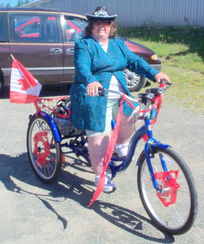 me on my bike at the parade - A picture of me riding my bike in the Rotary Festival Parade.
