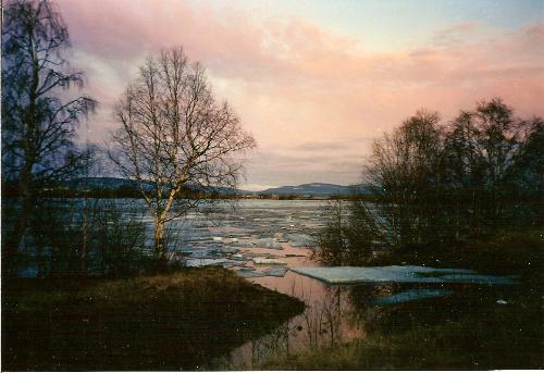 Colors of Spring - I was walking along the riverside on a spring evening. Only a click and there it was, my Creator´s work of art became this photo. The ice melts and floats down the river, usually during the first half of May.
