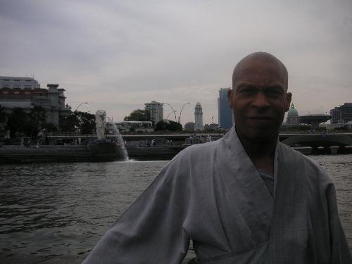 Me - I'm a monk from the US but not living in the US.  This is a picture of me in Paris.  I don't live in Paris.