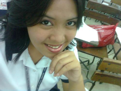 A picture of me during foundation day - This is a picture of myself taken last year around the first week of September. There is a bingo game in the assembly hall of the school and took a snapshot of me while the game is not starting already. I didn't won a prize. how sad.